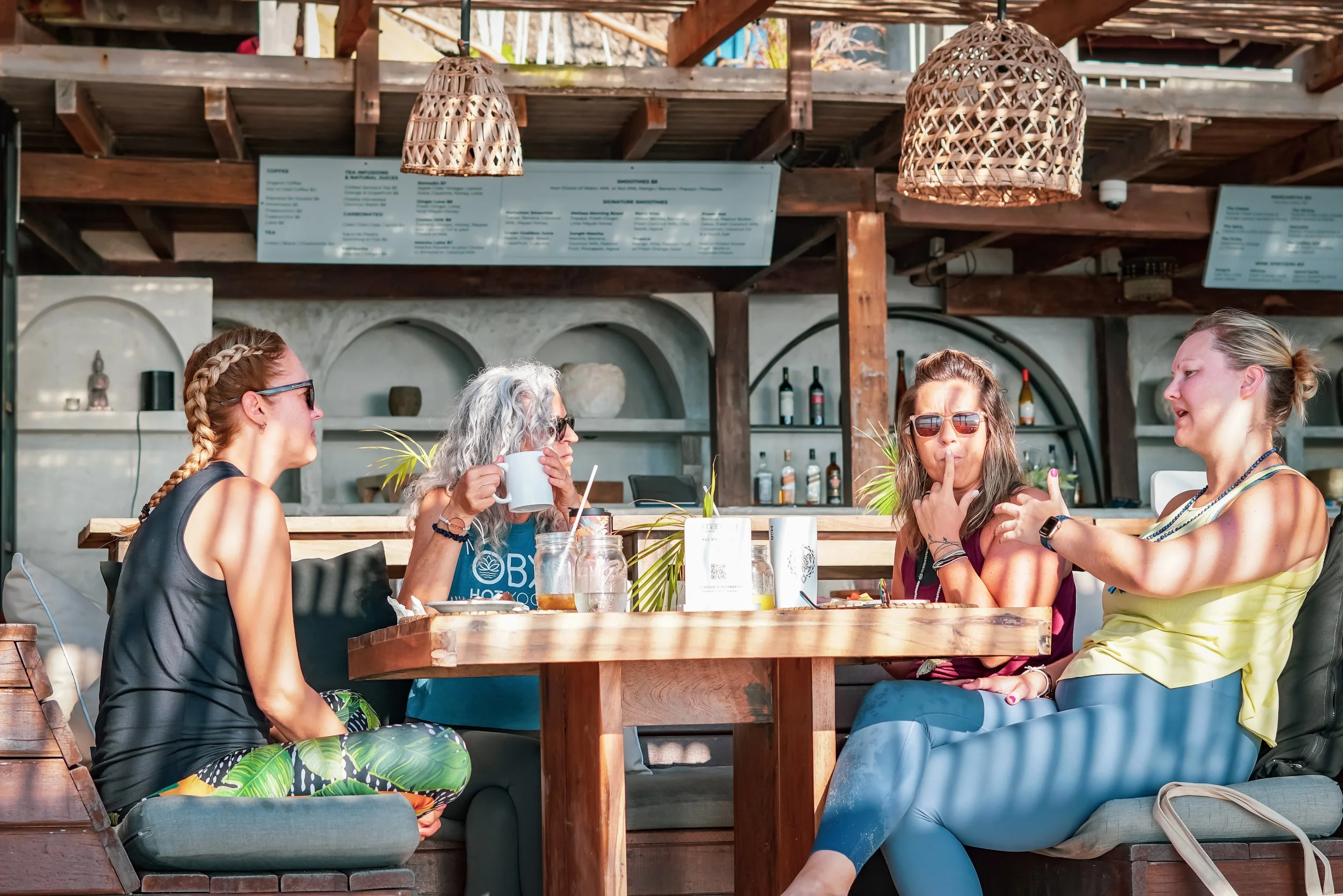 Four girls are sharing the meals, which are part of the resort package.