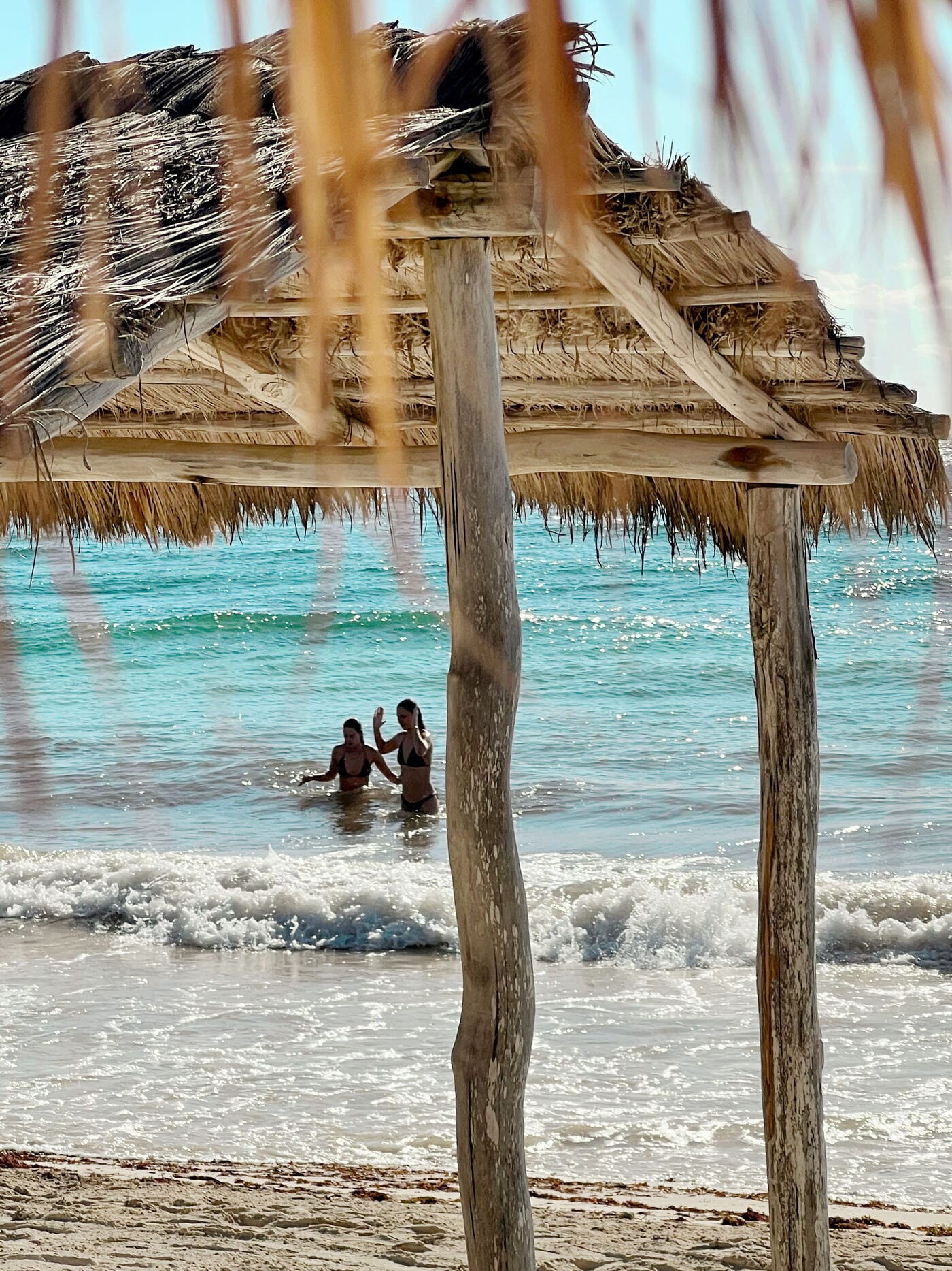 Women in the ocean at Tulum